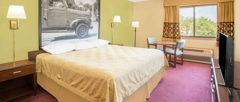 Desk, laptop workspace, blackout curtains, iron/ironing board