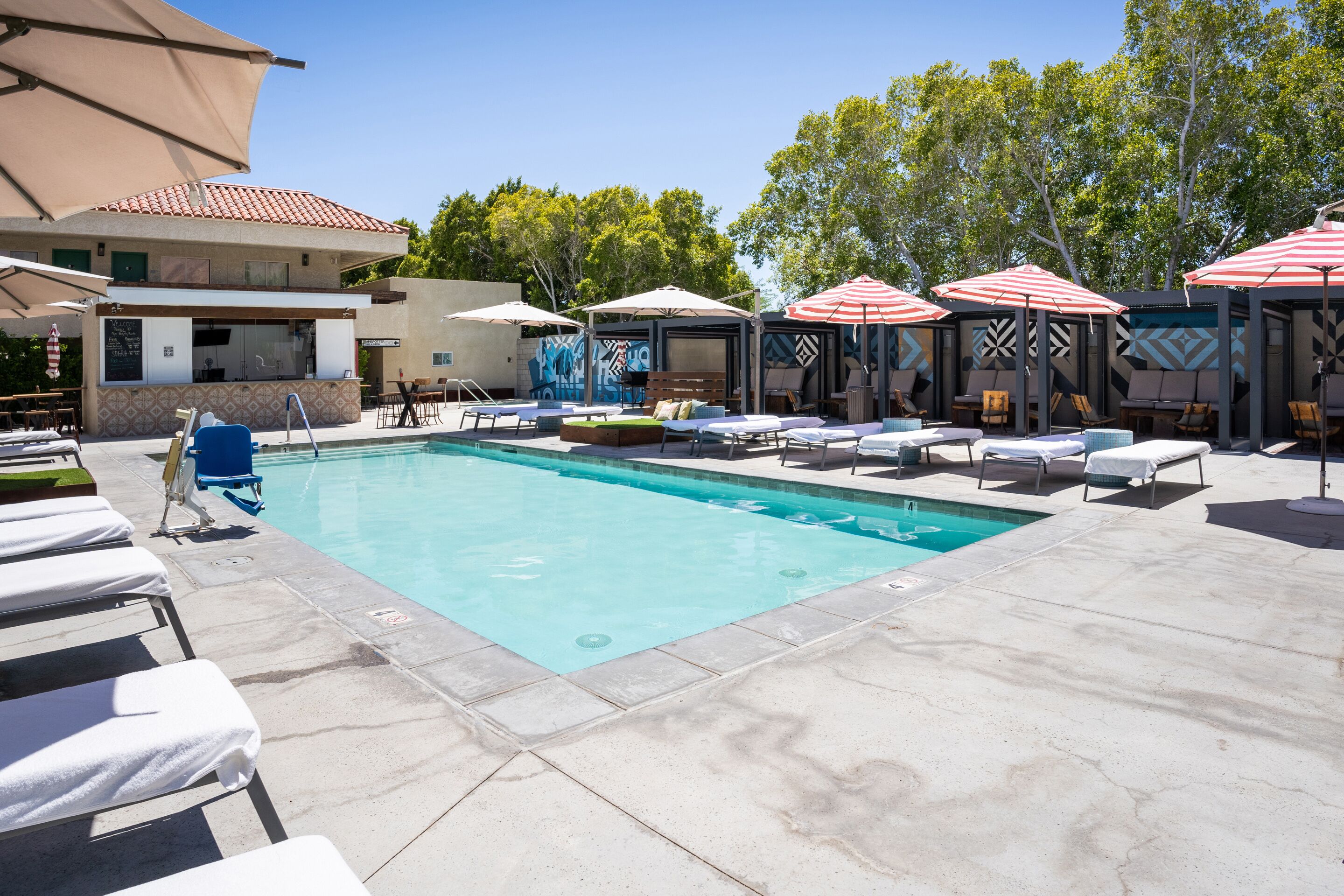 Outdoor pool, open 7:00 AM to midnight, free cabanas, pool umbrellas