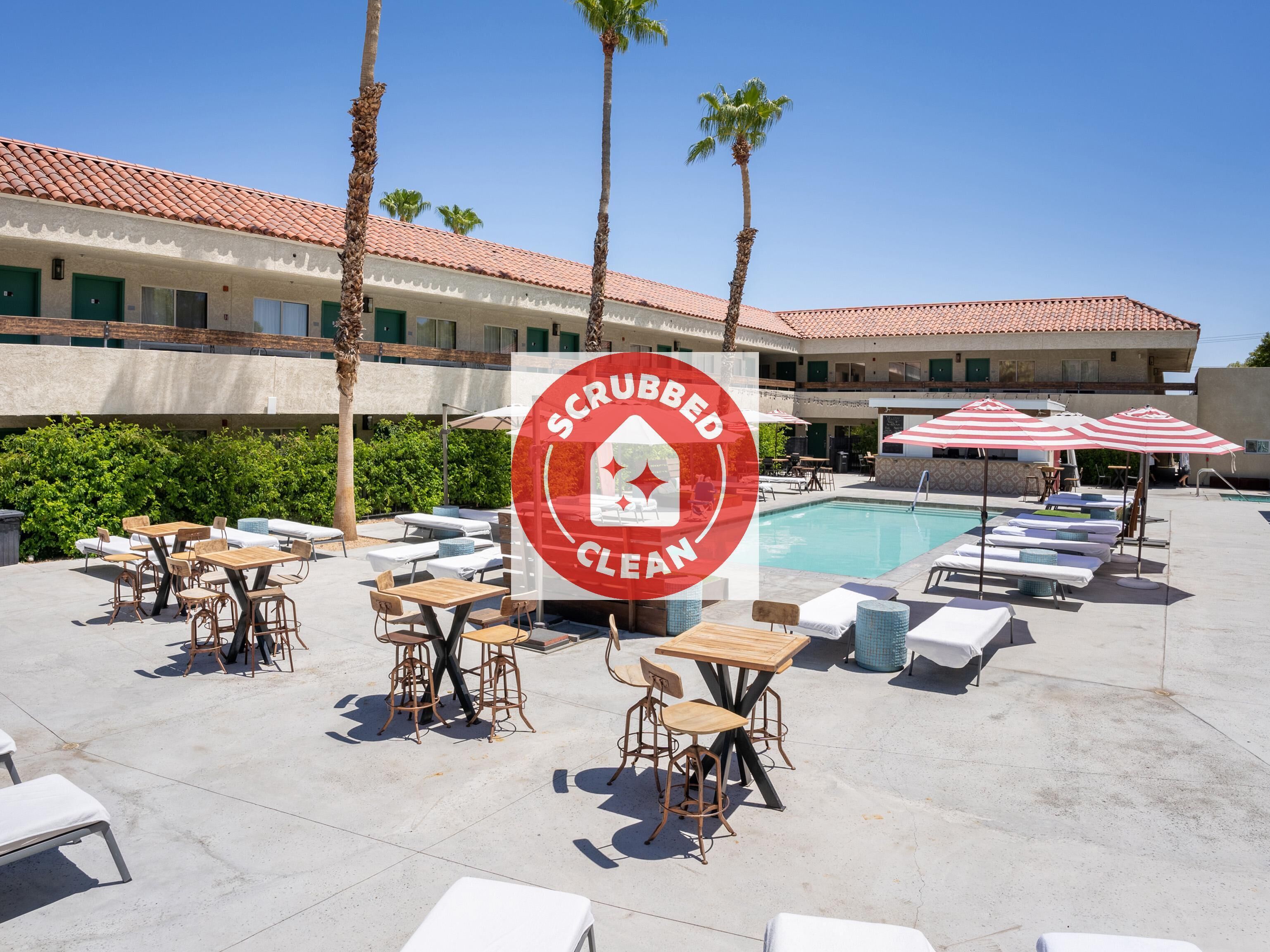 Outdoor pool, open 7:00 AM to midnight, free cabanas, pool umbrellas