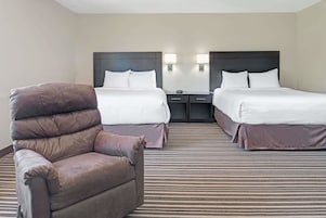 Ropa de cama de alta calidad, colchones con pillow-top y escritorio