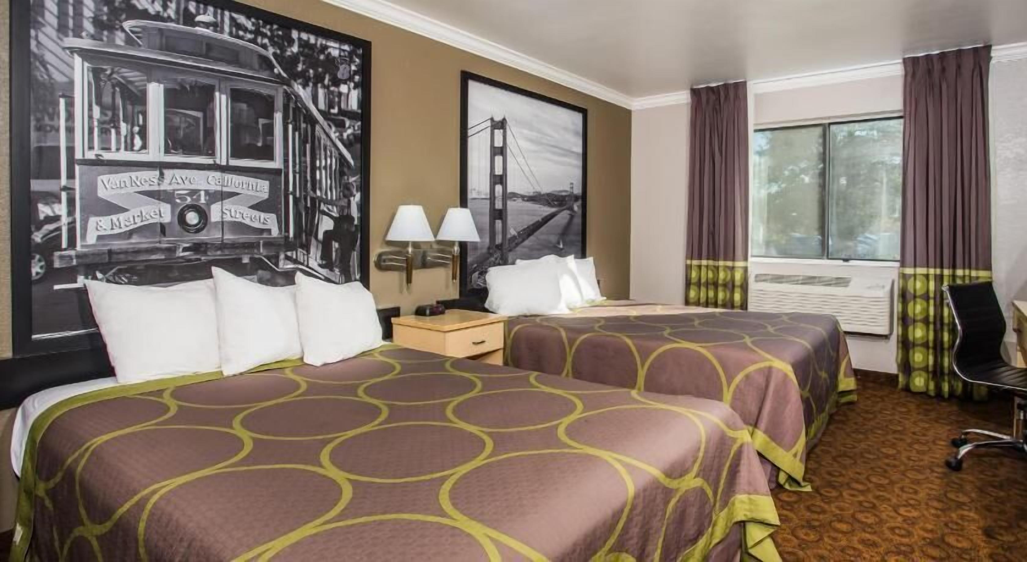 Pillowtop beds, desk, laptop workspace, soundproofing