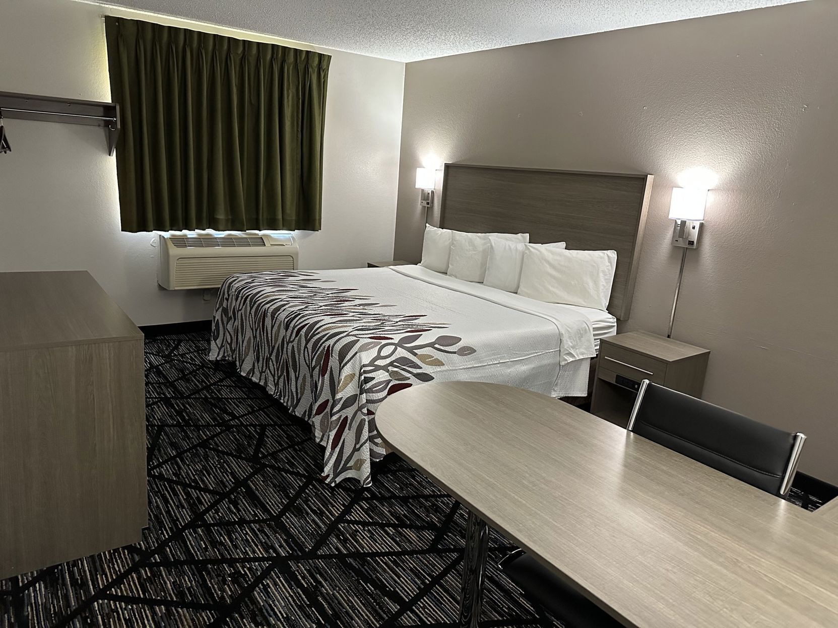 Desk, blackout curtains, free WiFi, bed sheets