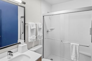 Separate tub and shower, free toiletries, hair dryer, bathrobes