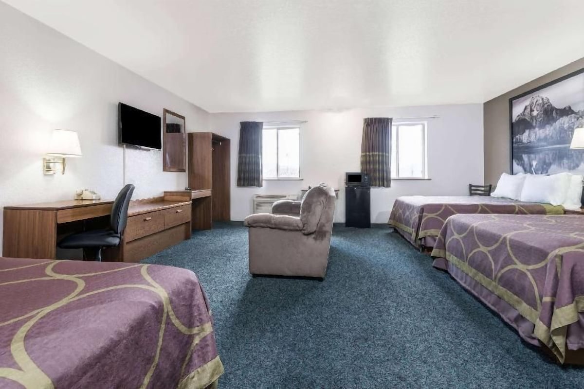Desk, laptop workspace, iron/ironing board (on request), cribs (free)