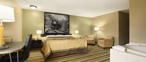 Deluxe Studio Suite, 1 King Bed, Non Smoking | In-room safe, desk, laptop workspace, blackout drapes