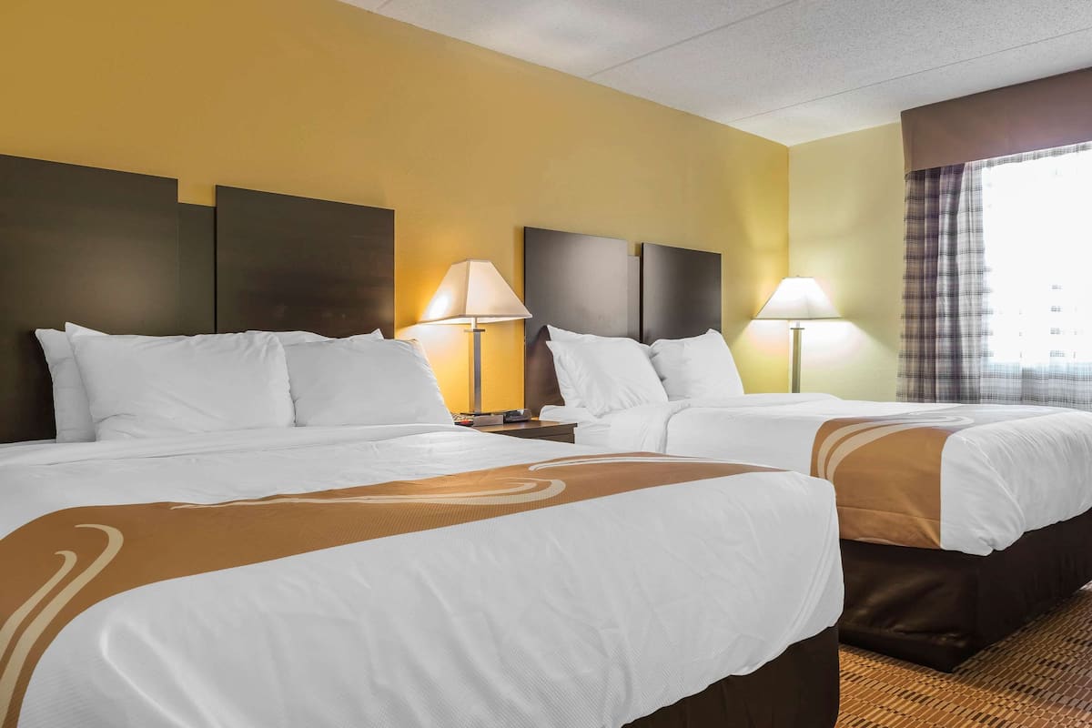 Standard Room, 2 Queen Beds, Non Smoking | Desk, iron/ironing board, WiFi (free), bed sheets