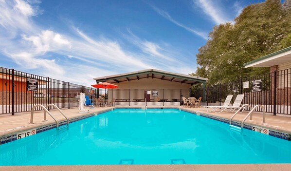 Outdoor pool, open 9:00 AM to 10:00 PM, pool umbrellas, sun loungers