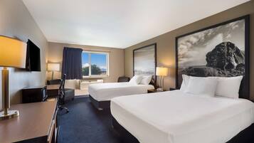 Cortinas opacas, tabla de planchar con plancha, camas supletorias