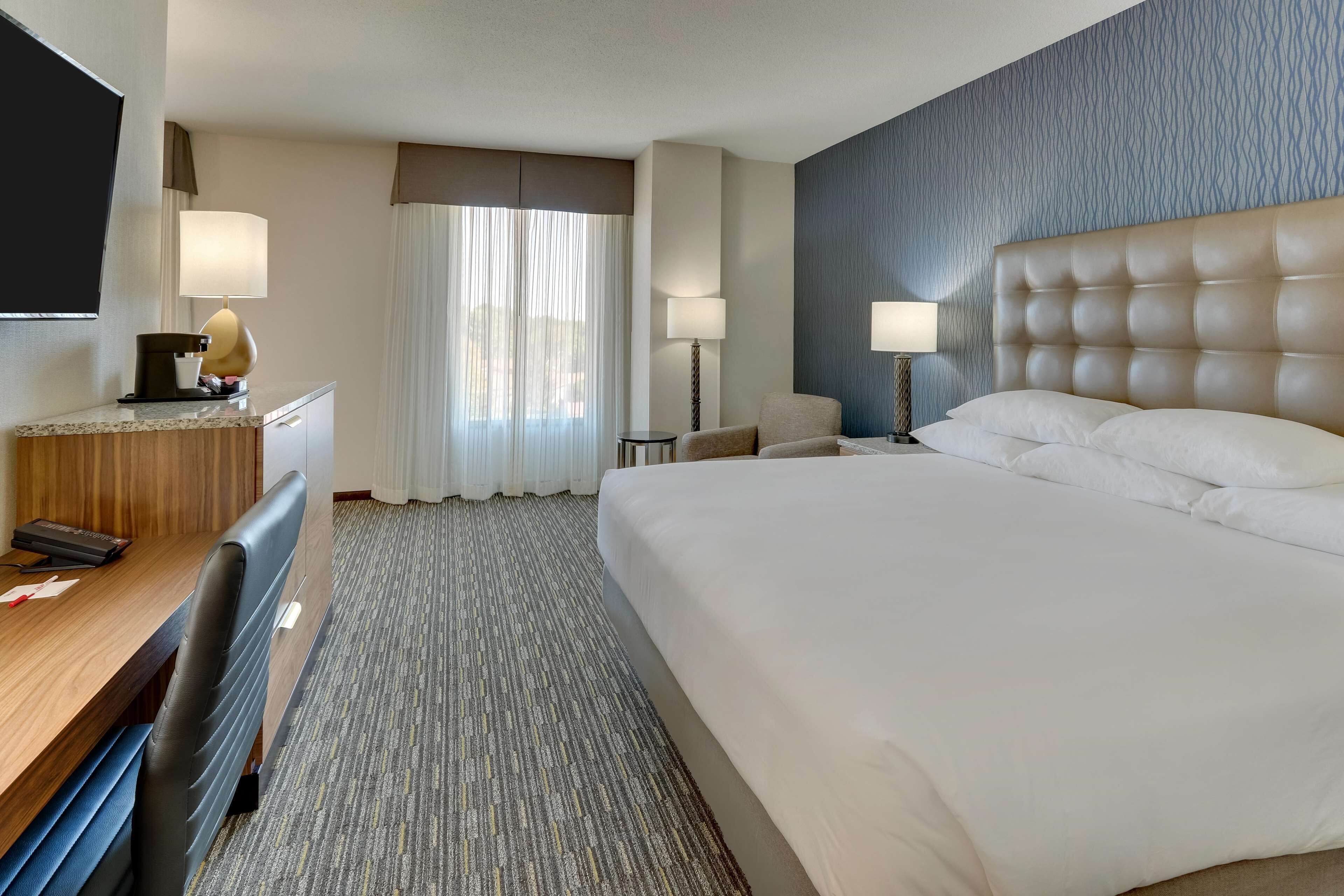 desk, blackout curtains, iron/ironing board, free cots/infant beds