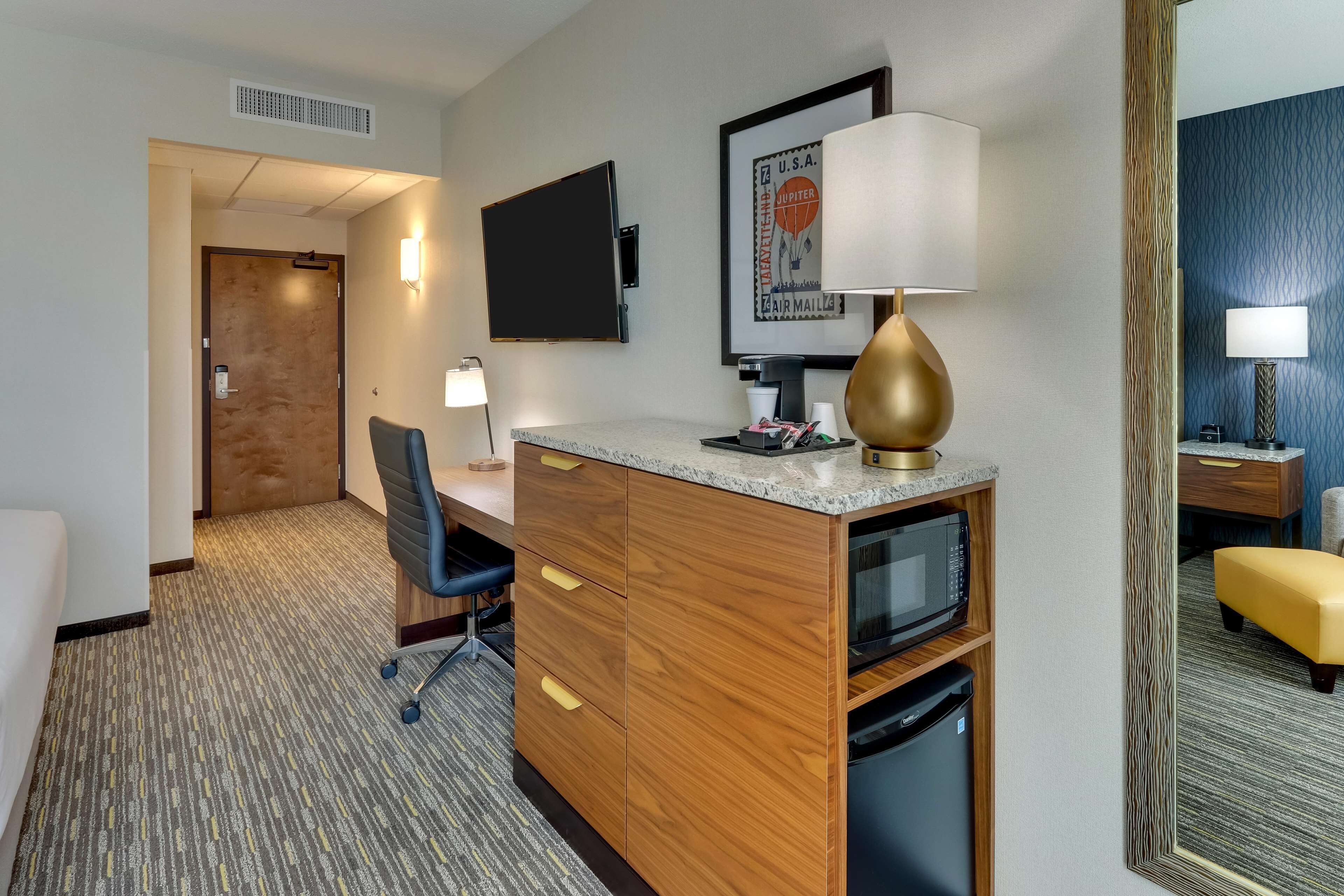 desk, blackout curtains, iron/ironing board, free cots/infant beds