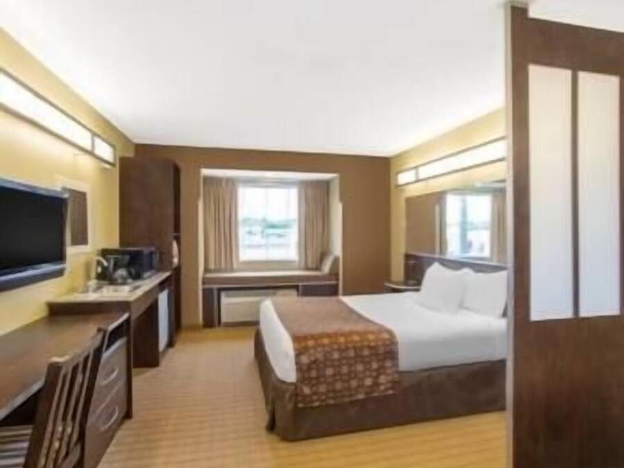 Pillowtop beds, desk, blackout drapes, iron/ironing board