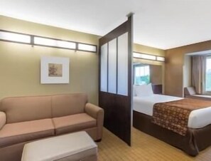 Pillowtop beds, desk, blackout drapes, iron/ironing board