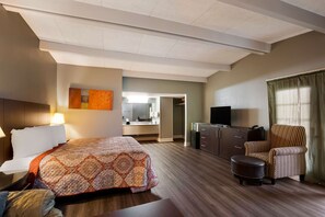 Ropa de cama de alta calidad y caja de seguridad en la habitación 