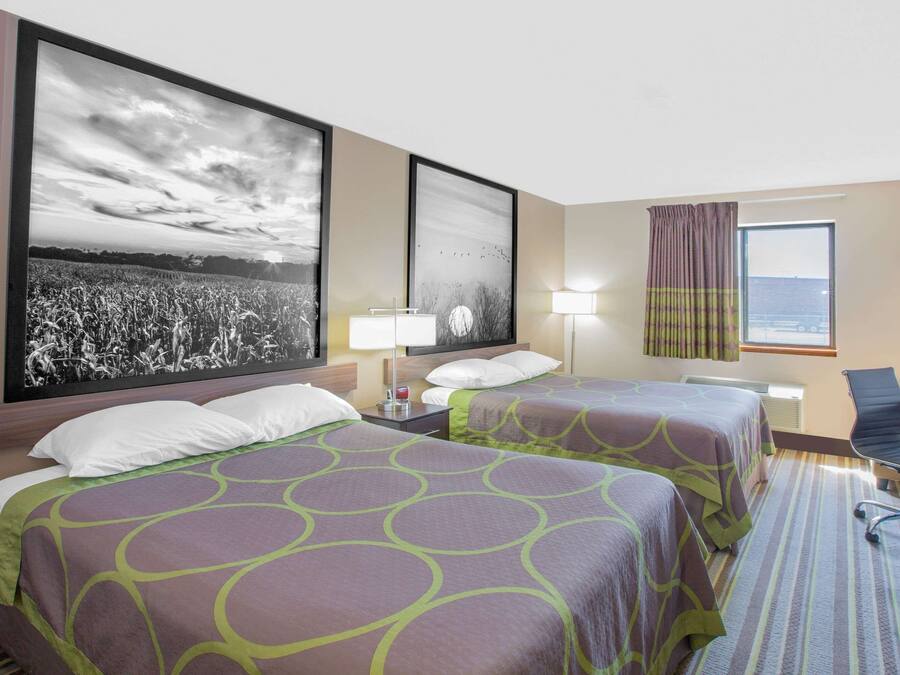 Memory-foam beds, desk, laptop workspace, blackout curtains