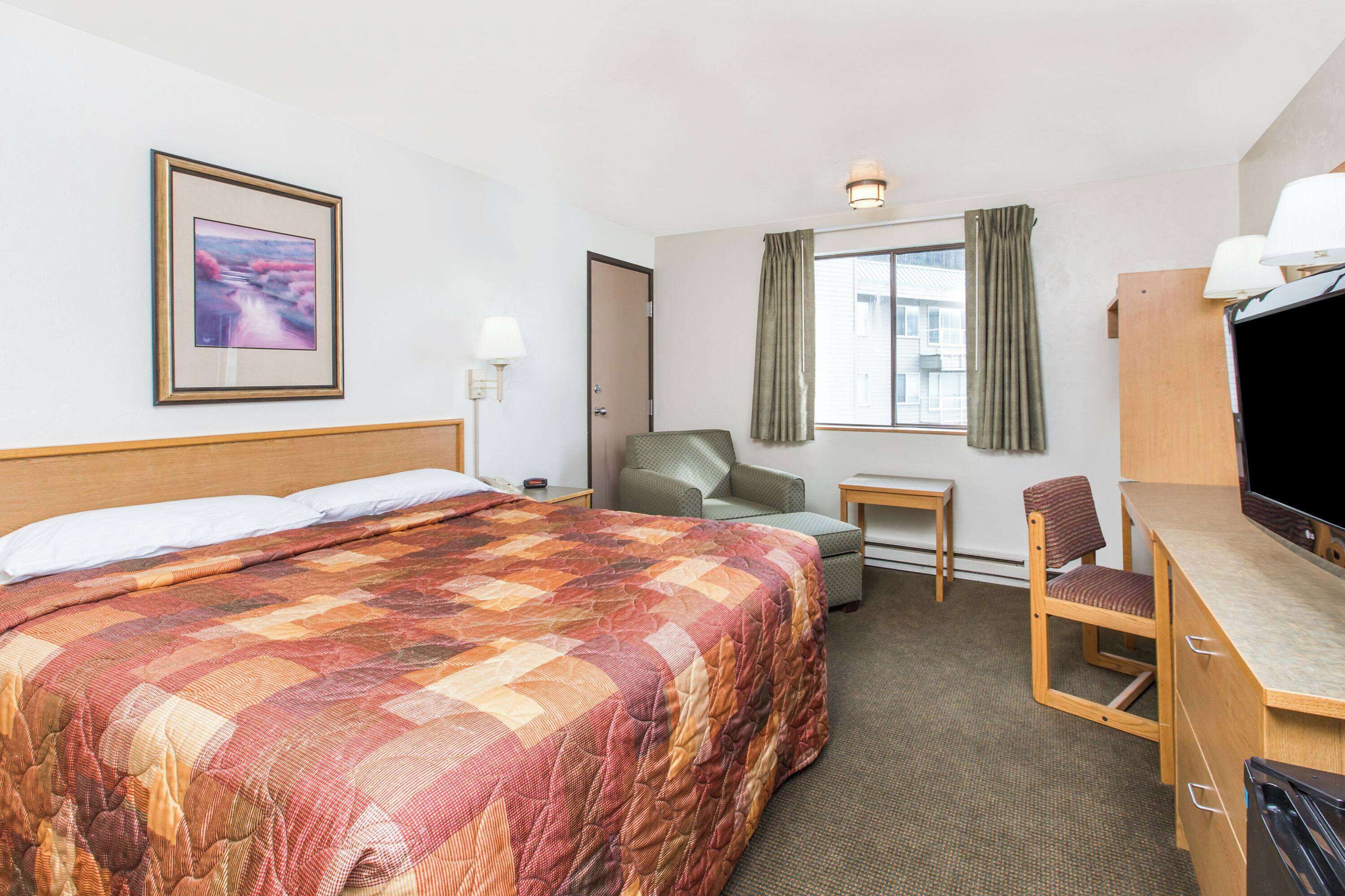 Desk, laptop workspace, blackout curtains, iron/ironing board