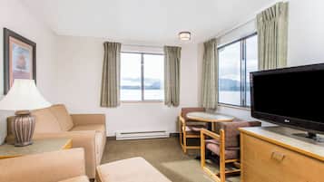 Desk, laptop workspace, blackout curtains, iron/ironing board