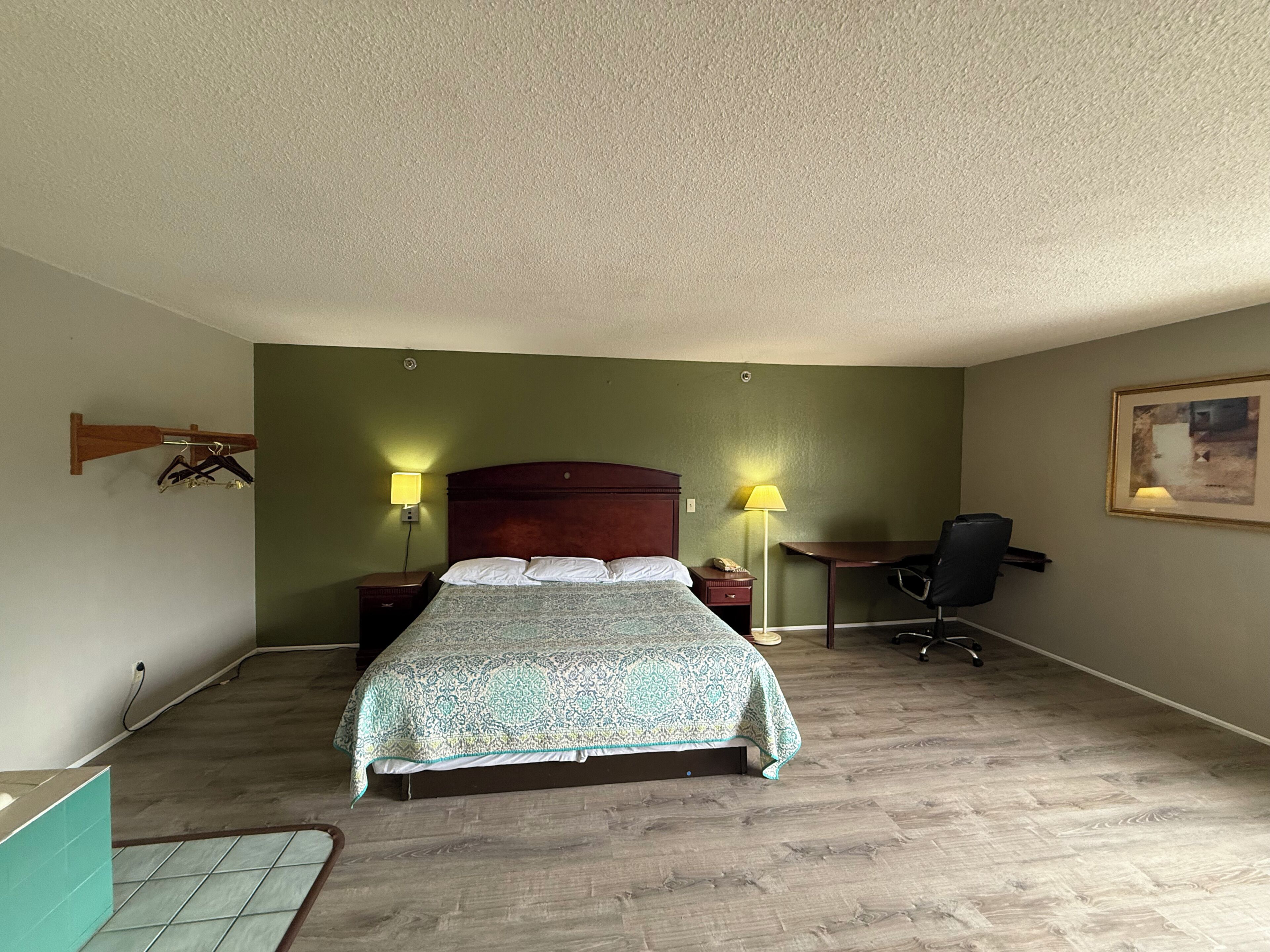 Room, 1 King Bed, Non Smoking, Jetted Tub | Desk, iron/ironing board, free WiFi, bed sheets
