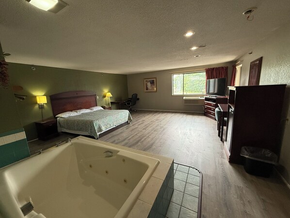 Room, 1 King Bed, Non Smoking, Jetted Tub | Desk, iron/ironing board, free WiFi, bed sheets - Coldwater Inn & Suites near I 69 (Coldwater)