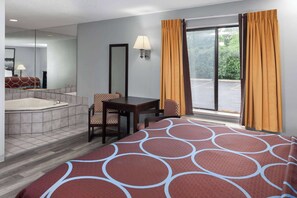 Whirlpool room, 1 King Bed, Non Smoking | 1 bedroom, desk, blackout drapes, free cribs/infant beds