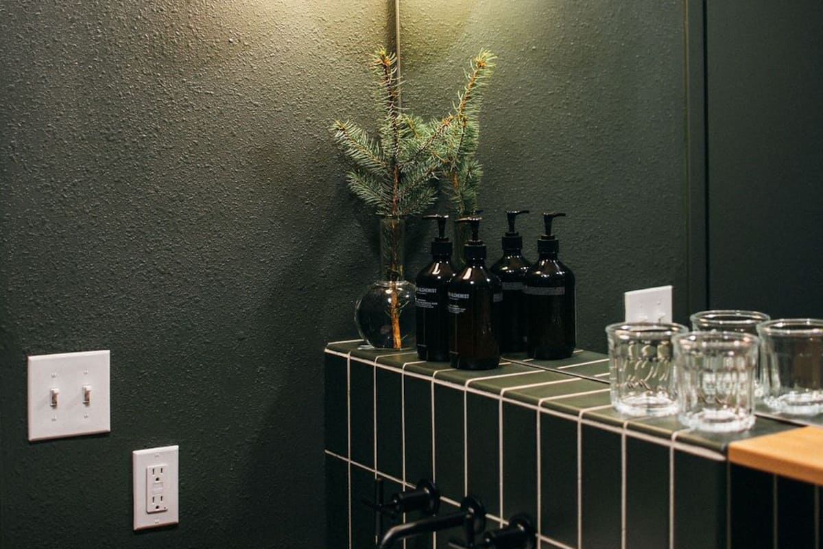 shower, designer toiletries, hair dryer, towels