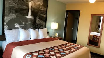 Suite, 1 King Bed, Non Smoking (One-Bedroom) | Free cribs/infant beds, rollaway beds, free WiFi, bed sheets