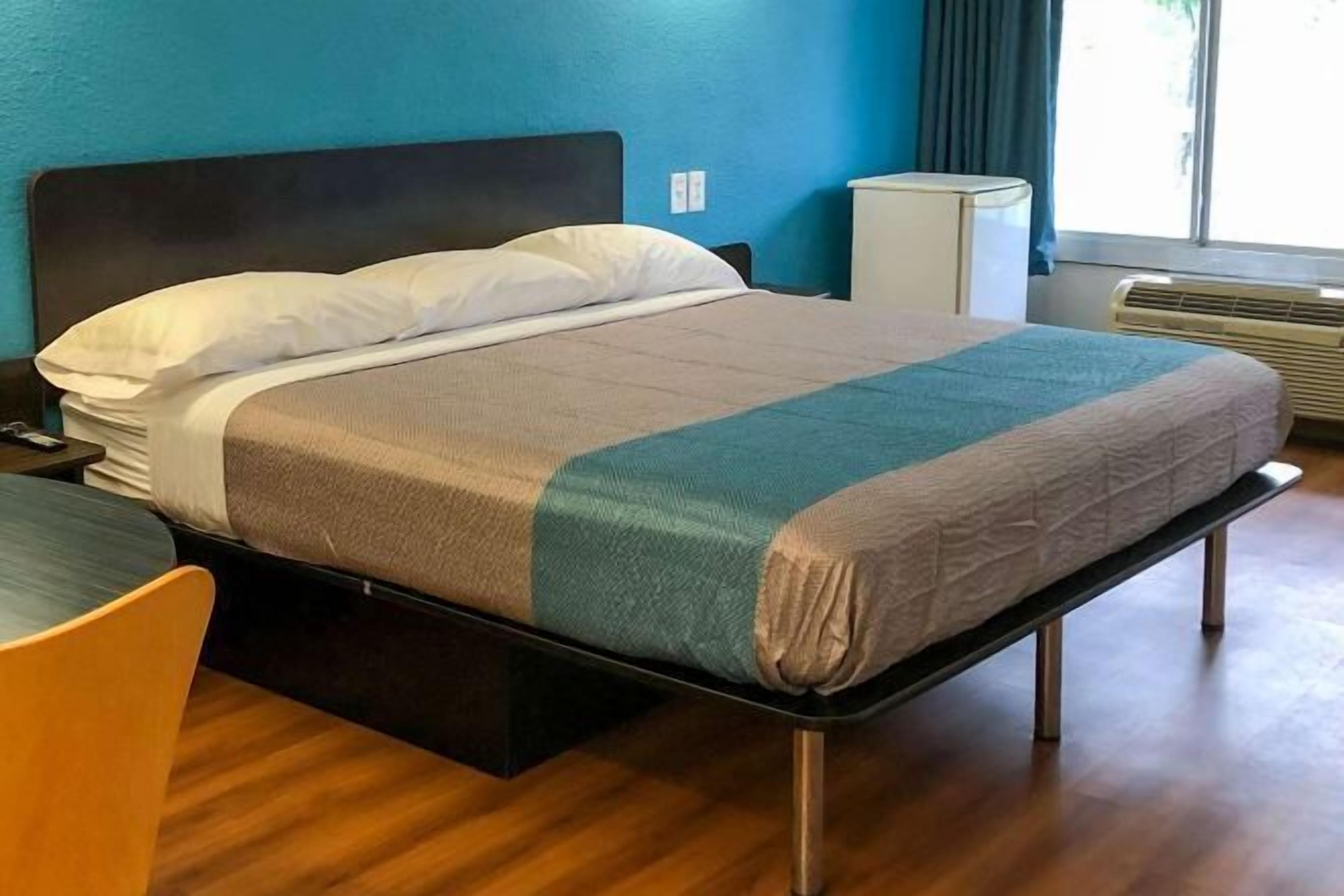 Desk, laptop workspace, free WiFi, bed sheets