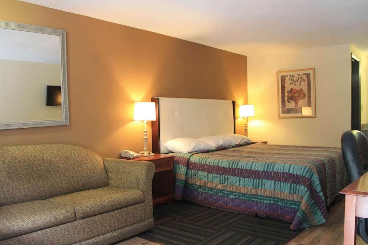 Room, 1 King Bed, Smoking | Rollaway beds, free WiFi, bed sheets