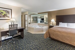 Suite, 1 King Bed, Non Smoking, Jetted Tub (Balcony View) | Bed sheets, alarm clocks - Quality Inn Rochelle (Rochelle)