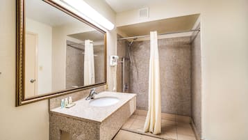 Combined shower/bathtub, hair dryer, towels