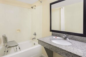 Room, 1 King Bed, Accessible, Smoking | Bathroom | Combined shower/tub, free toiletries, hair dryer, towels