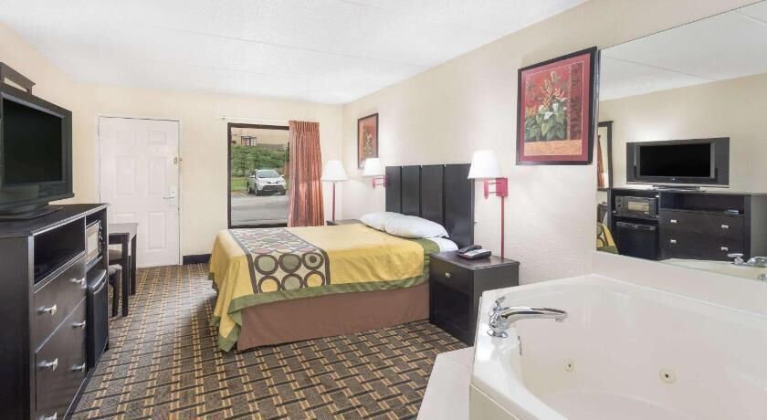 Desk, laptop workspace, blackout curtains, free WiFi