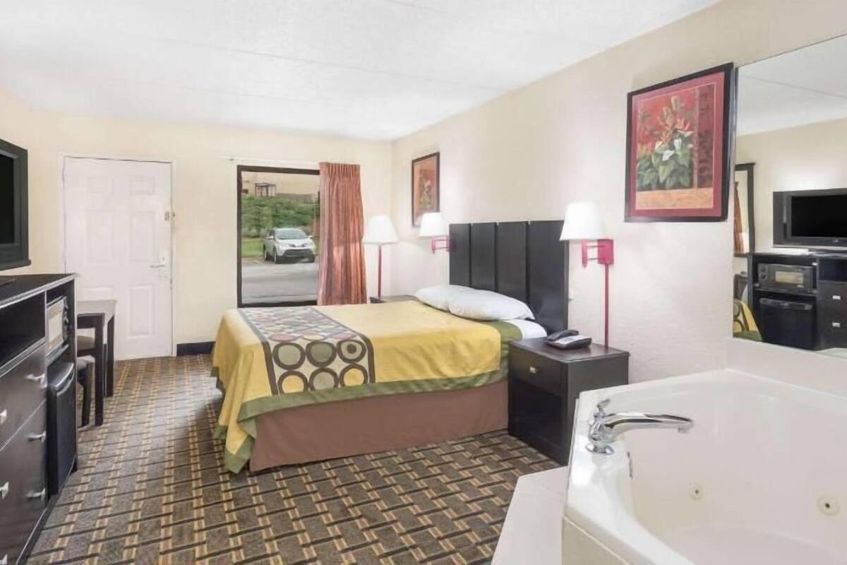 Desk, laptop workspace, blackout curtains, free WiFi