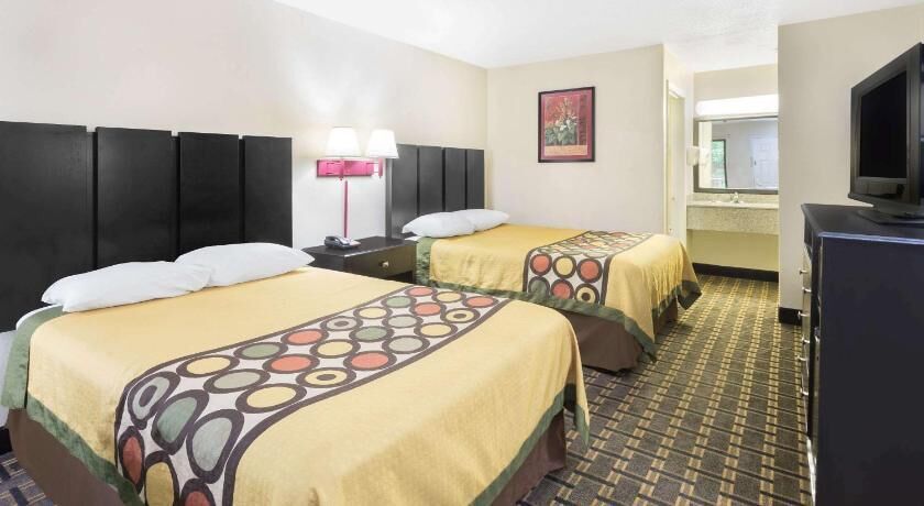 Desk, laptop workspace, blackout curtains, free WiFi
