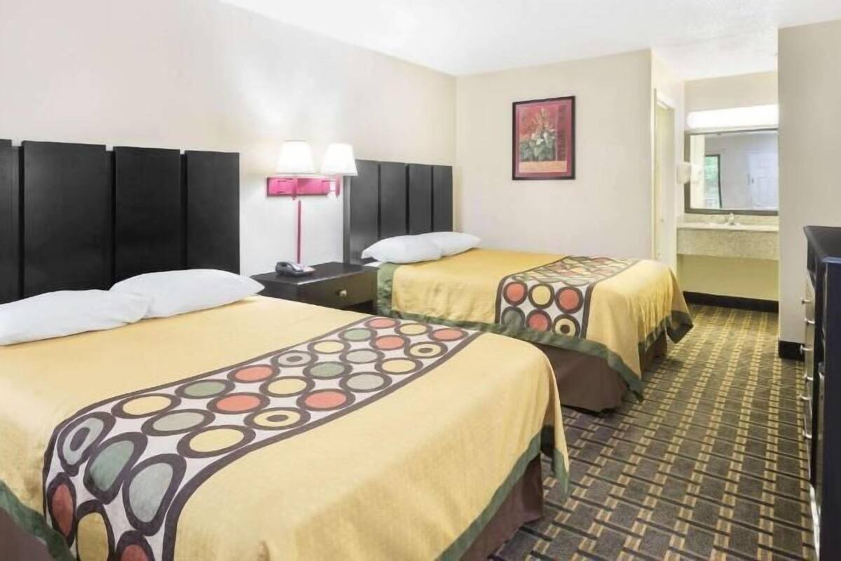 Desk, laptop workspace, blackout curtains, free WiFi