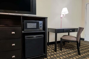Desk, laptop workspace, blackout curtains, free WiFi