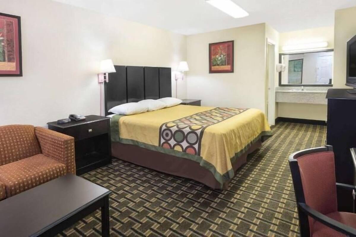 Desk, laptop workspace, blackout curtains, free WiFi