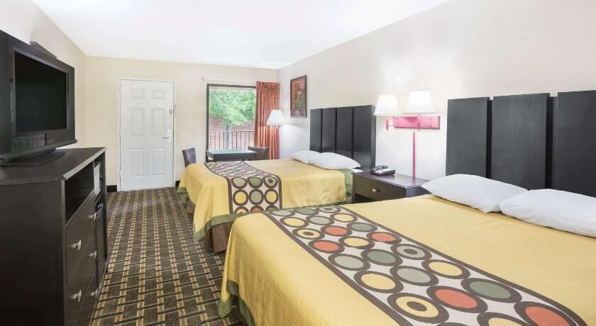 Desk, laptop workspace, blackout curtains, free WiFi