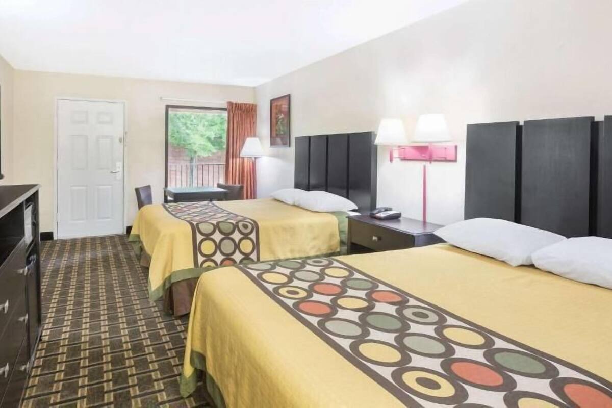 Desk, laptop workspace, blackout curtains, free WiFi