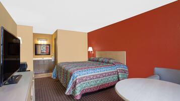 Room, 1 King Bed | Desk, blackout drapes, iron/ironing board, free WiFi