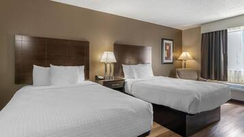 Ropa de cama hipoalergénica y tabla de planchar con plancha