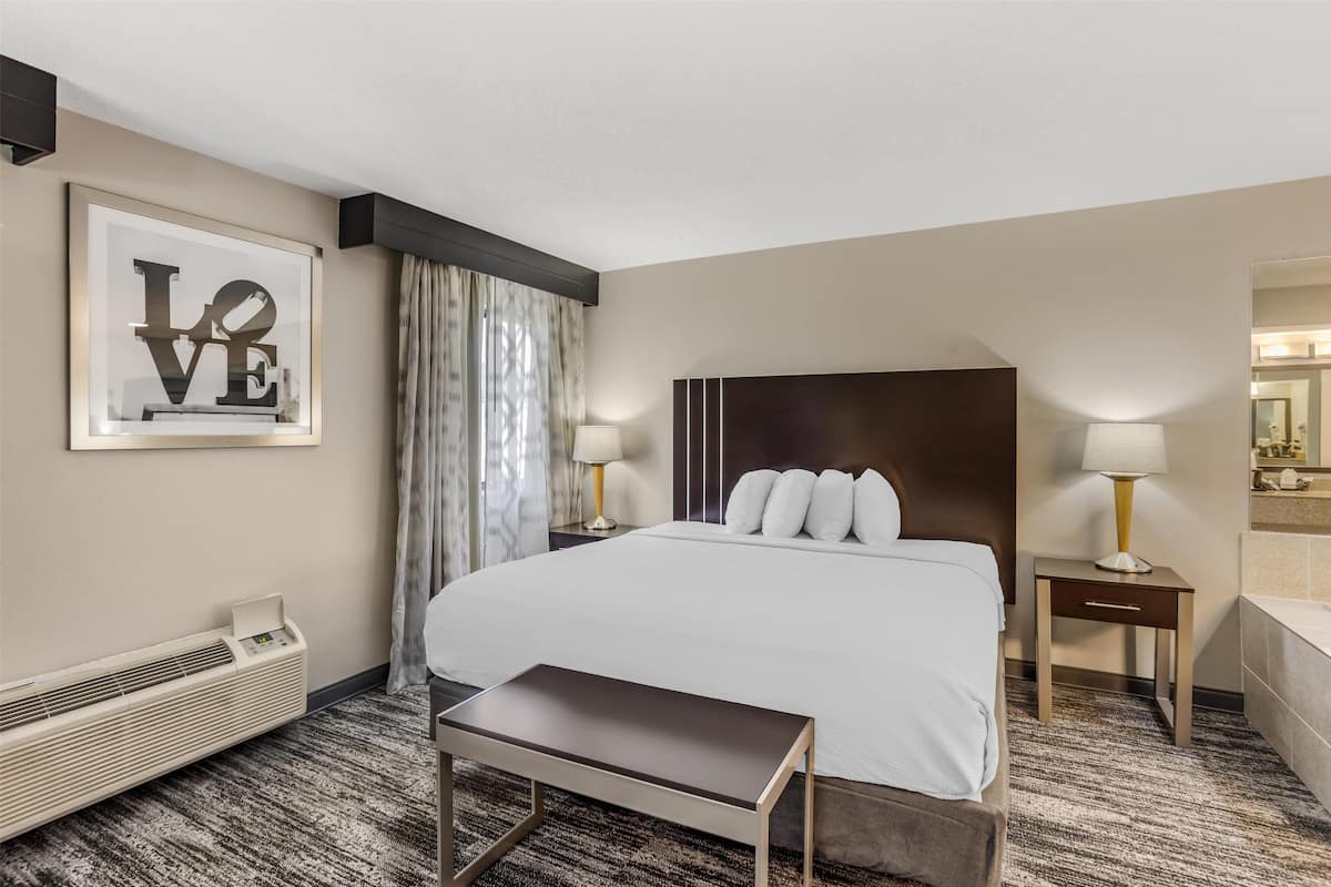 Suite, 1 King Bed, Jetted Tub | Individually decorated, individually furnished, desk, laptop workspace