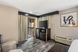 Suite, 1 King Bed, Jetted Tub | Individually decorated, individually furnished, desk, laptop workspace