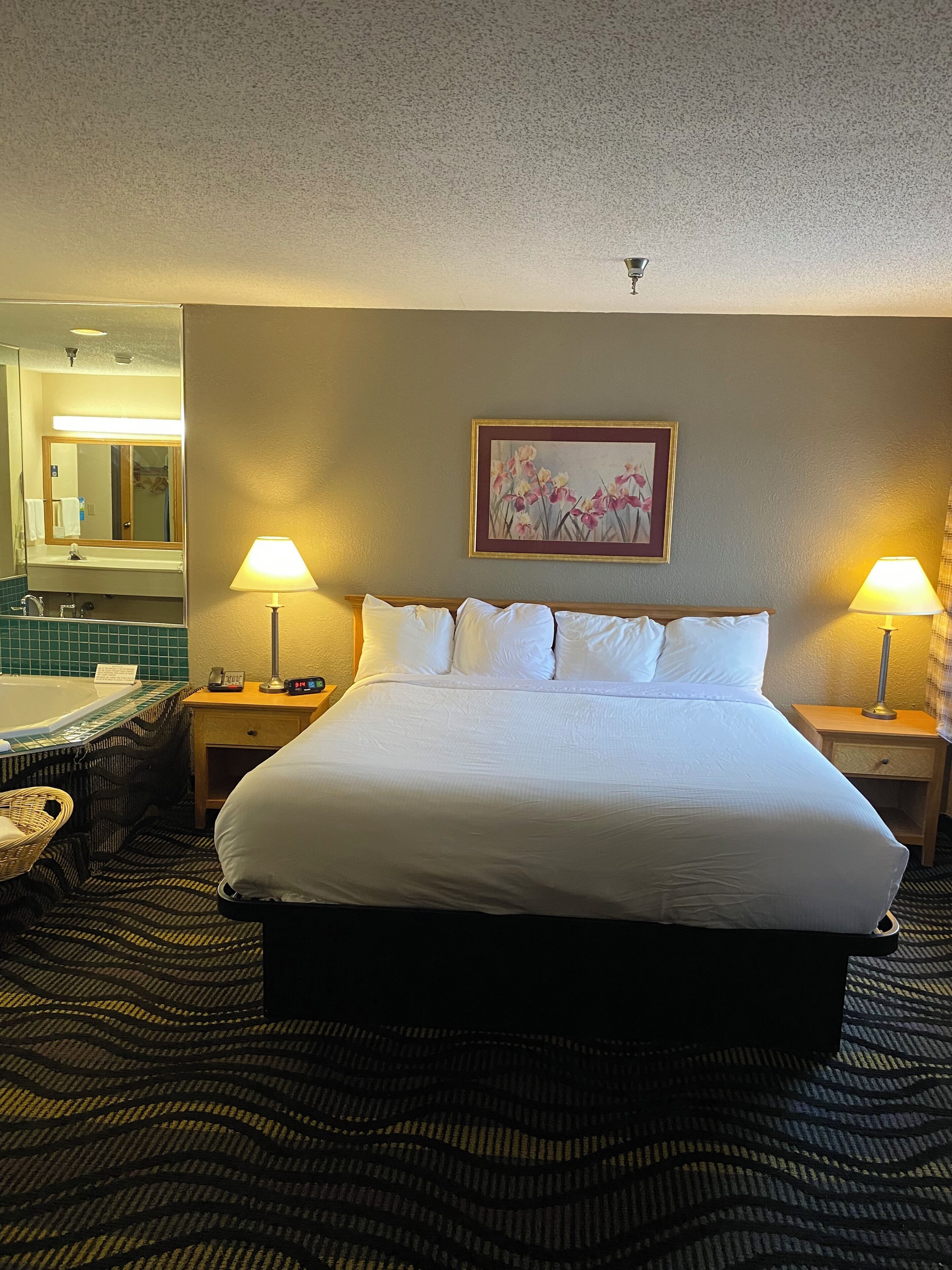 Suite, 1 King Bed, Non Smoking, Jetted Tub | In-room safe, blackout drapes, iron/ironing board, free rollaway beds