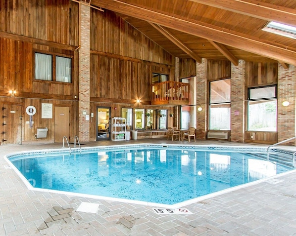 Indoor pool, open 8:00 AM to 10:00 PM, pool loungers