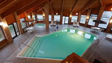 Indoor pool, open 9 AM to 9:00 PM, pool umbrellas, sun loungers