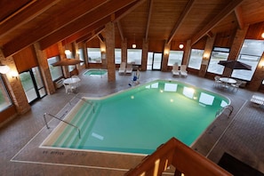 Indoor pool, open 9 AM to 9:00 PM, pool umbrellas, sun loungers