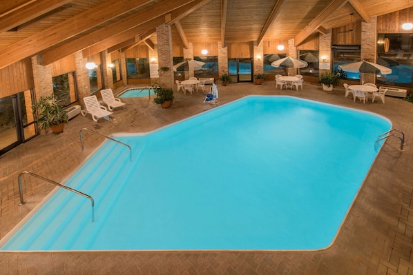 Indoor pool, open 9 AM to 9:00 PM, pool umbrellas, pool loungers
