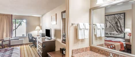 Desk, blackout curtains, free WiFi, bed sheets