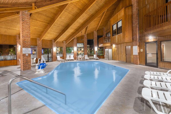 Indoor pool, open 11:00 AM to 9:00 PM, pool loungers