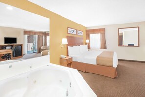 Suite, 1 King Bed | In-room safe, rollaway beds, free WiFi, bed sheets